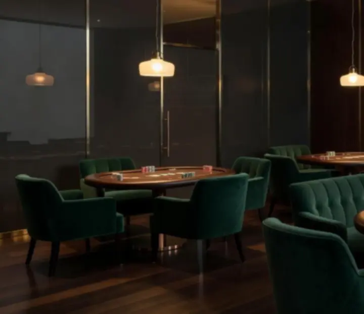 Dark timber Australian lounge with smoked glass and copper lighting for card nights